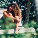 woman sitting on bench