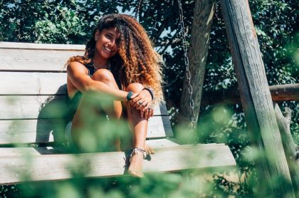 woman sitting on bench