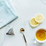 Lemon tea, teabag and spoon